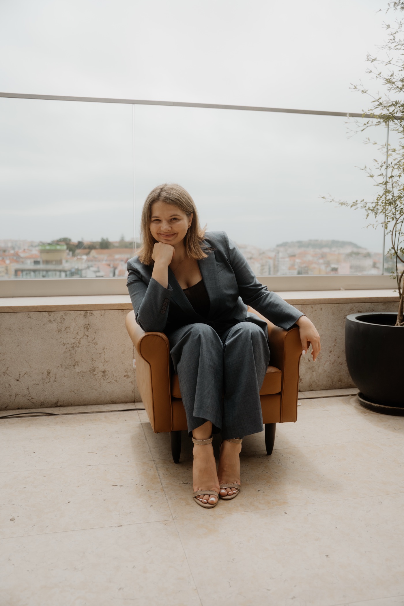 Agata Andryszczak seated, overlooking Lisbon