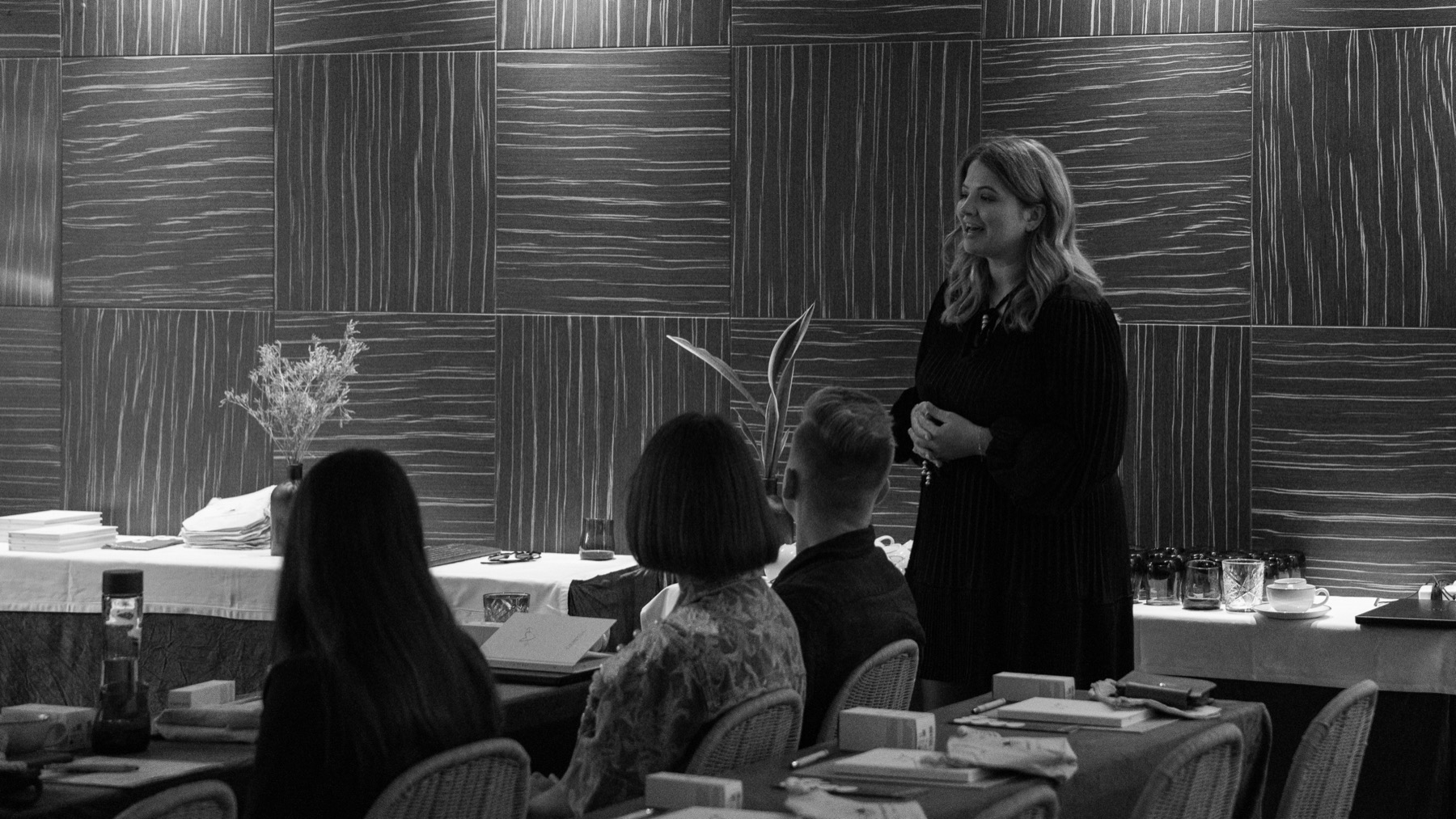 Agata Andryszczak speaking to a seated audience